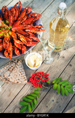 Meal with crayfishes on outdoor table Stock Photo