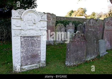 The gravestone of John Peel, the famous hunter, in the church yard at Coldbrookdale in Cumbria. Stock Photo