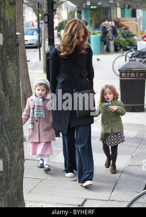 Trinny Woodall walks with her daughter and her daughters friend Trinny appears to have excess facial hair London, England - Stock Photo