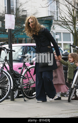 Trinny Woodall walks with her daughter and her daughters friend Trinny appears to have excess facial hair London, England - Stock Photo