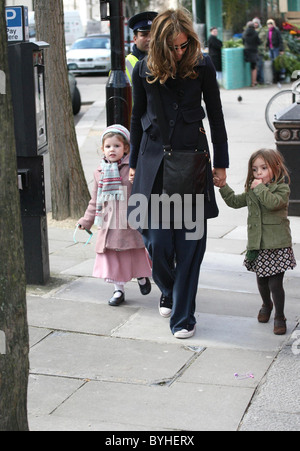 Trinny Woodall walks with her daughter and her daughters friend Trinny appears to have excess facial hair London, England - Stock Photo