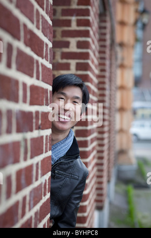 Asian-American Young Man Smiling Looking At Camera Stock Photo