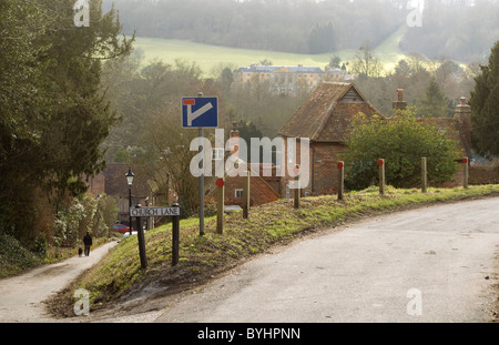 a view from Church lane over the rooftops, houses and homes of West Wycombe village Buckinghamshire UK Stock Photo