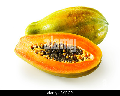 Fresh Formosa papaya cut, against a white background as a cut out Stock Photo