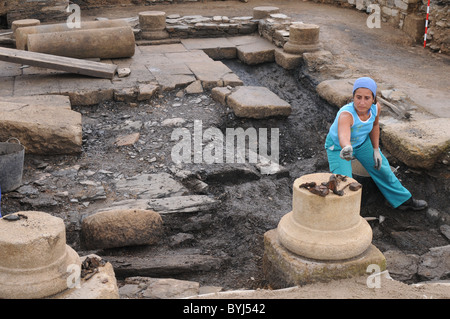 Working in the patio of the ' Domus '   Archaeological site ' Chao Samartin ' Asturias SPAIN Stock Photo