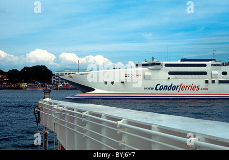 Condor Ferries High Speed Ferry Condor Vitesse enters Poole Harbour, Poole, Dorset, from France, pictured from Sandbanks ferry Stock Photo