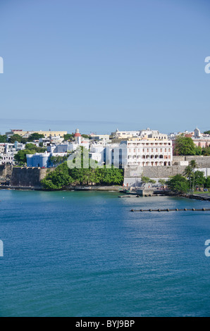 Puerto Rico view of Old San Juan as seen from arriving cruise ship in San Juan Bay, historic spanish architecture la fortelaza Stock Photo