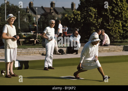 Old people playing lawn bowls Stock Photo