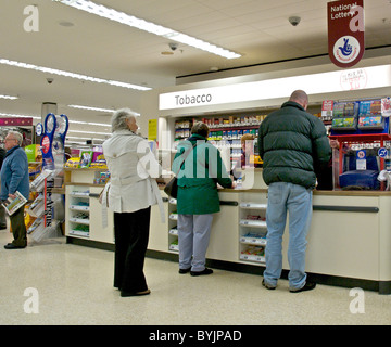 Interior of large store showing the wide range of merchandise available. This area is the tobaconist Stock Photo