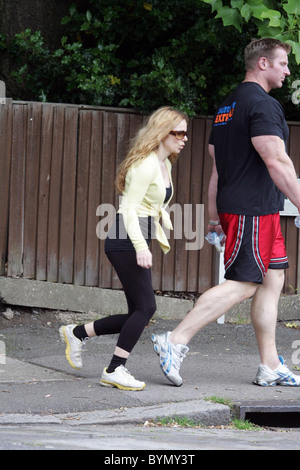 Geri Halliwell and her personal fitness trainer go to her local park to exercise London, England - 12.06.07 Stock Photo