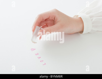 Woman Holding Rubber Stamp Love Heart Shape Stock Photo