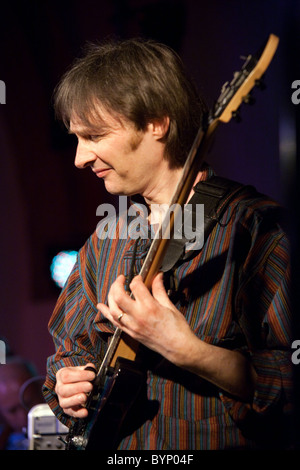 Dave Bainbridge, lead guitarist with the celtic rock band Iona, playing on stage In UK, May 2010 Stock Photo