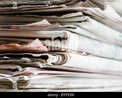 old newspapers in stack. Copy space Stock Photo