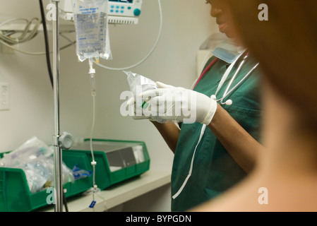 Nurse preparing medical equipment Stock Photo