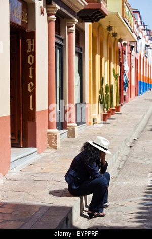 On the phone in San Cristobal de las Casas, Chiapas, Mexico Stock Photo