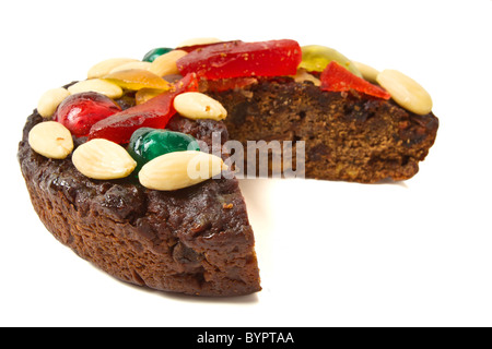 Italian Chocolate Fruit Cake topped with nuts and glace fruits. Stock Photo