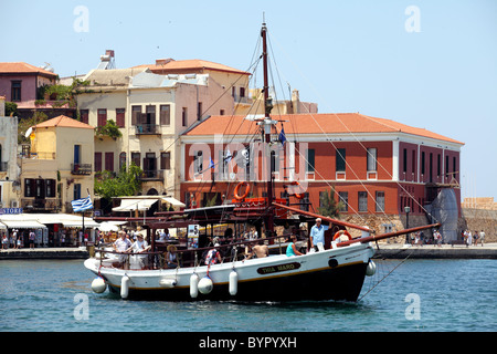Trippers embark on a one-hour cruise from Chania to Lazaretta aboard the Thio Mara. Stock Photo