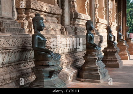 Bronze Buddha statues, Haw Pha Kaew, now a museum of art and antiquities, Vientiane, Laos Stock Photo