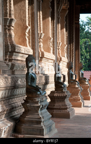 Bronze Buddha statues, Haw Pha Kaew, now a museum of art and antiquities, Vientiane, Laos Stock Photo