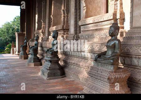 Bronze Buddha statues, Haw Pha Kaew, now a museum of art and antiquities, Vientiane, Laos Stock Photo