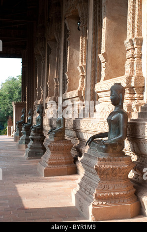 Bronze Buddha statues, Haw Pha Kaew, now a museum of art and antiquities, Vientiane, Laos Stock Photo