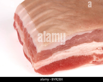 Fresh Uncooked Butchered Joint Of Belly Pork Ready For Cooking Against A White Background With No People And A Clipping Path Stock Photo