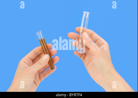 Clean and dirty water samples in test tube Stock Photo - Alamy