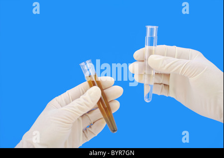 Clean and dirty water samples in test tube Stock Photo