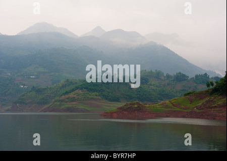 shennong stream near yangzi river and town of badong on a foggy day; hubei province, china Stock Photo