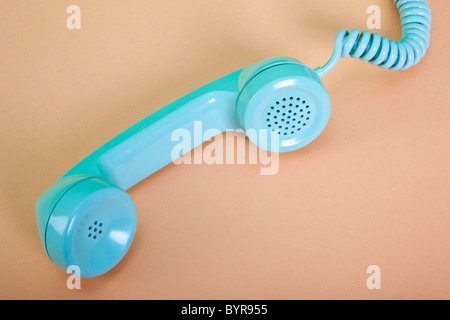 vintage American green telephone receiver off the hook Stock Photo