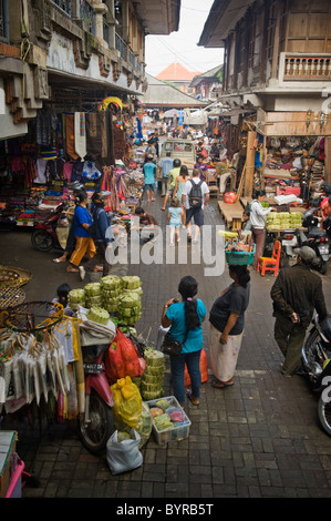 The public market in Ubud, Bali, Indonesia is a very busy place early in the morning. All manner of goods are available. Stock Photo