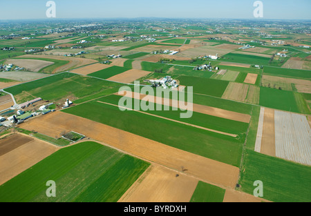 Agriculture - Aerial view of farmsteads and agricultural fields in mid Spring / near Lancaster, Pennsylvania, USA. Stock Photo