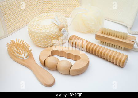 Bath set - sisal/cotton back massage belt, massage brush with wooden studs, massage roller, sponge, loofah, nylon tuff. Stock Photo