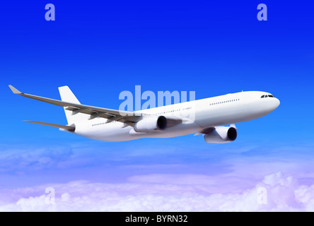 passenger plane in the blue sky Stock Photo - Alamy