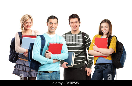 Four happy students posing with books Stock Photo