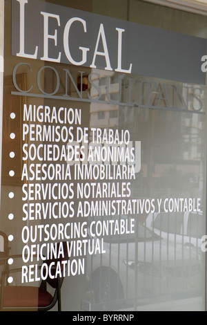 Storefront Window Language A graphic logo on storefront window of Fanta Sea, displays seashell and ...