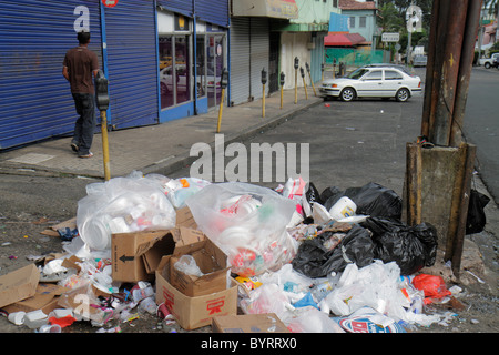 panama calidonia neighborhood lower scene class street city pollution garbage pile trash sidewalk plastic bags