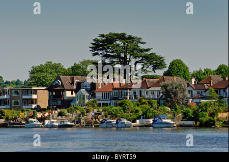 LONDON, UK - MAY 24, 2010: Houses on the River Thames between Hampton Court and Kingston Upon Thame Stock Photo