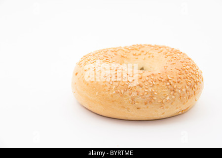 A sesame seed bagel on a white background Stock Photo