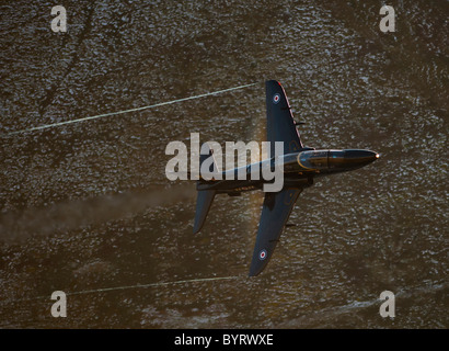 A raf Hawk Lowe flying in north wales the mach loop they go as low as 250ft Stock Photo