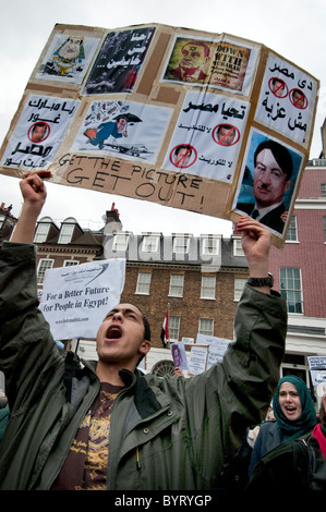 Egyptian community in Britain protesting during revolution against Mubarak at Egyptian Embassy  February 2011 Stock Photo