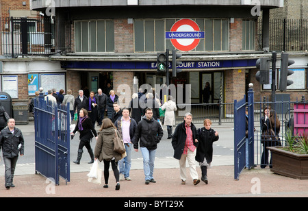 Passengers leaving Earls Court Underground Station on Warwick Road west London UK Stock Photo