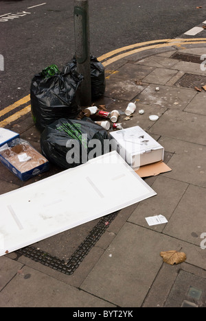 Rubbish left on the pavement of Denmark Street, London, WC2 Stock Photo