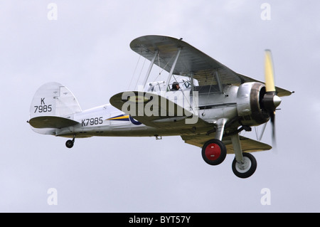 Gloster Gladiator Mk 1 biplane aircraft in RAF markings displaying at Duxford Flying Legends Airshow Stock Photo