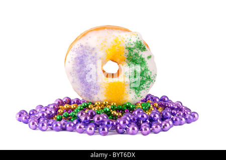 Donut with Mardi Gras throws Stock Photo