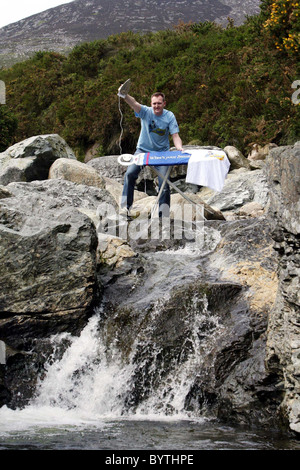 Extreme Ironing Adventure sports fans are being challenged to take up extreme ironing by ferry company Stena Line. The company Stock Photo