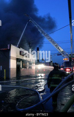 Dusk falls at scene of a fire in New Jersey Stock Photo