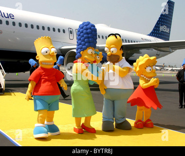 Bart, Marge, Maggie, Homer and Lisa Simpson Jet Blue unveils aircraft in celebration of ' The Simpsons ' movie release at Stock Photo