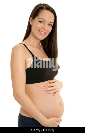 Pregnant woman holding her belly Stock Photo