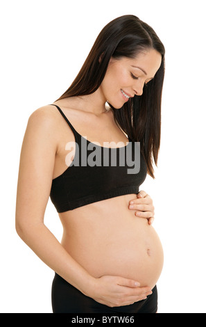 Pregnant woman holding her belly Stock Photo